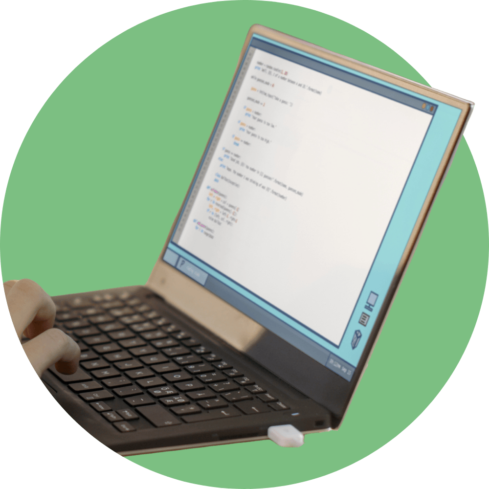 Person coding on a laptop screen