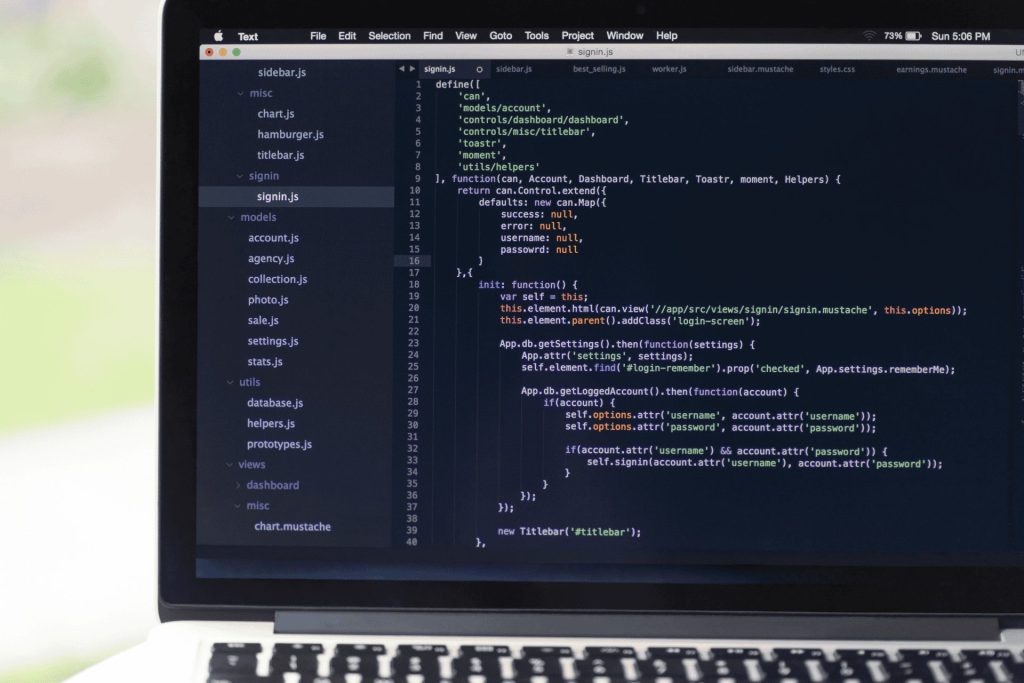 Code displayed on a MacBook screen