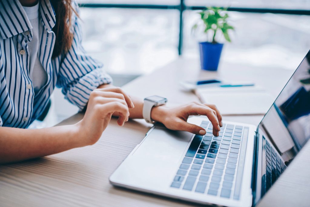 Person using a laptop on a desk