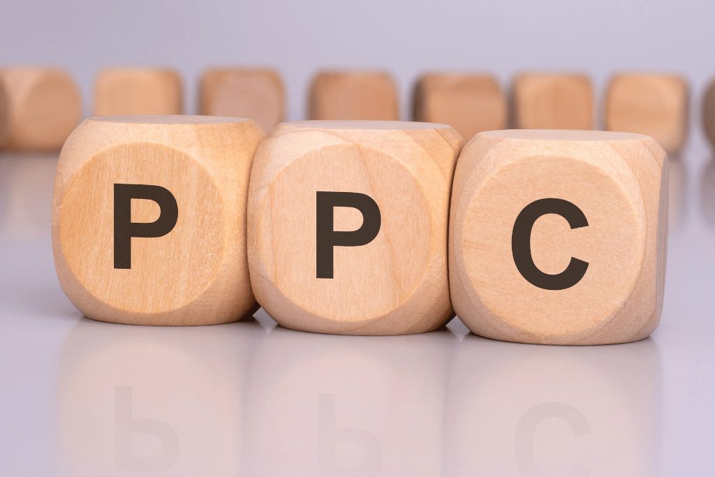 Wooden dice spelling out PPC